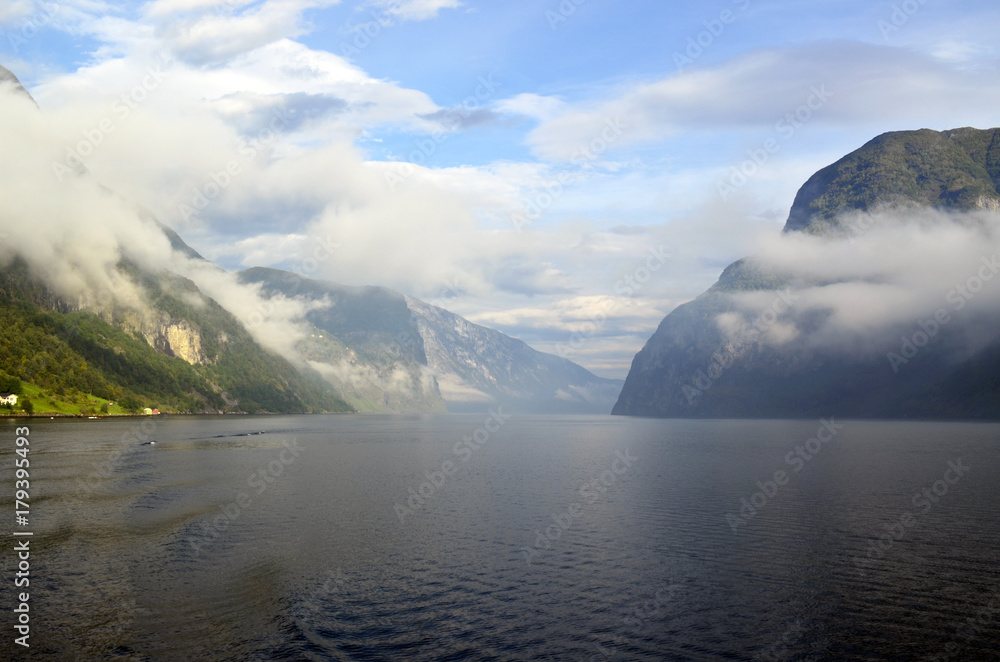 Clouds and mountains above the Norwegian fjords