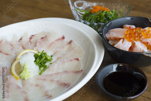 Japanese food set - Kampachi sashimi, Wakame salad and Salmon Toro.
