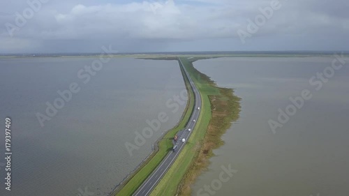 Wallpaper Mural Access road with cars driving to the island of Rømø in the Danish Wadden sea national park – Aerial 4K Torontodigital.ca