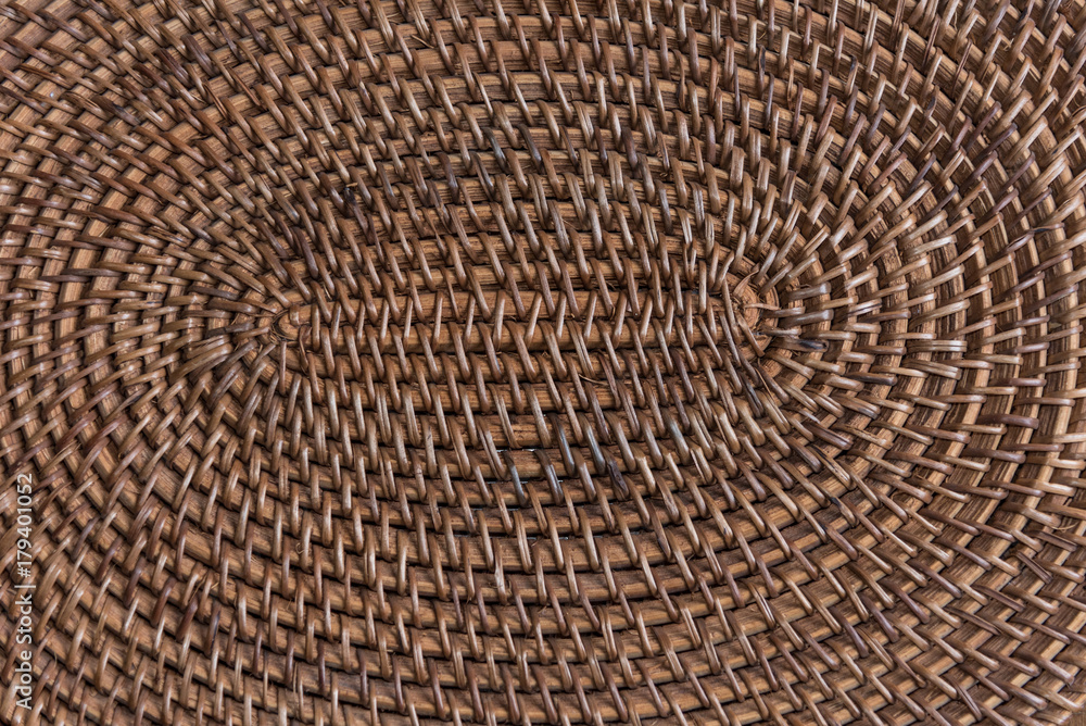 Wooden knitted oval pad background Wooden knitted oval pad background