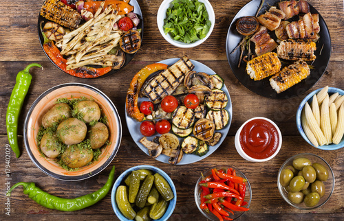 Photos Various vegan dishes and snacks. Grilled vegetables.