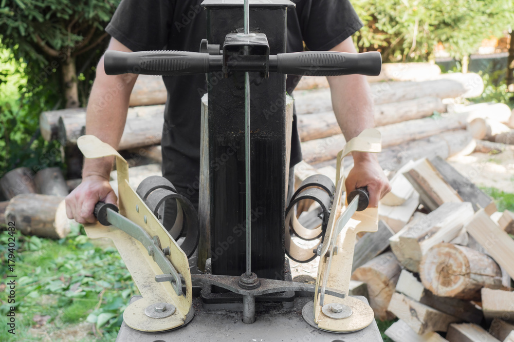Firewood split with wooden splitter Firewood split with wooden splitter