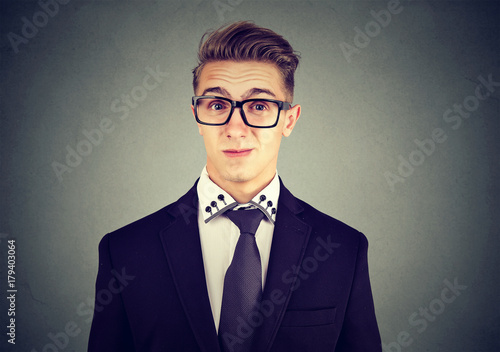 фотографія Young man with snobbish face expression