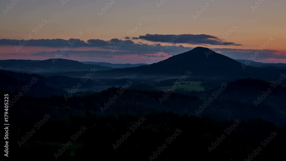 timelapse of sunset over the Ruzovsky vrch, highest peak of national park Bohemian Switzerland, Czech Republic, UHD 4K timelapse of sunset over the Ruzovsky vrch, highest peak of national park Bohemian Switzerland, Czech Republic, UHD 4K