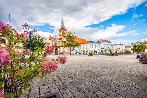 Main city square. Large market square in Swiecie on Vistula with neo-Gothic town hall from 1879. photo