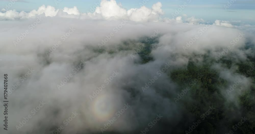 Aerial View. Flying over the beautiful mountain in clouds. Aerial View. Flying over the beautiful mountain in clouds.