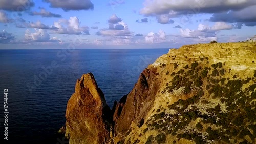seascape. camera flies over the sea and rocks , video from the drone, flight over the sea