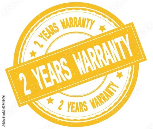2 YEARS WARRANTY , written text on yellow round rubber stamp.