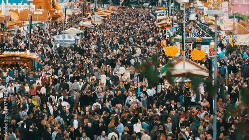 September 17, 2017 - Oktoberfest, Munich, Germany:View of the huge crowd of people walking around the Oktoberfest in national bavarian suits, on Theresienwiese, top view