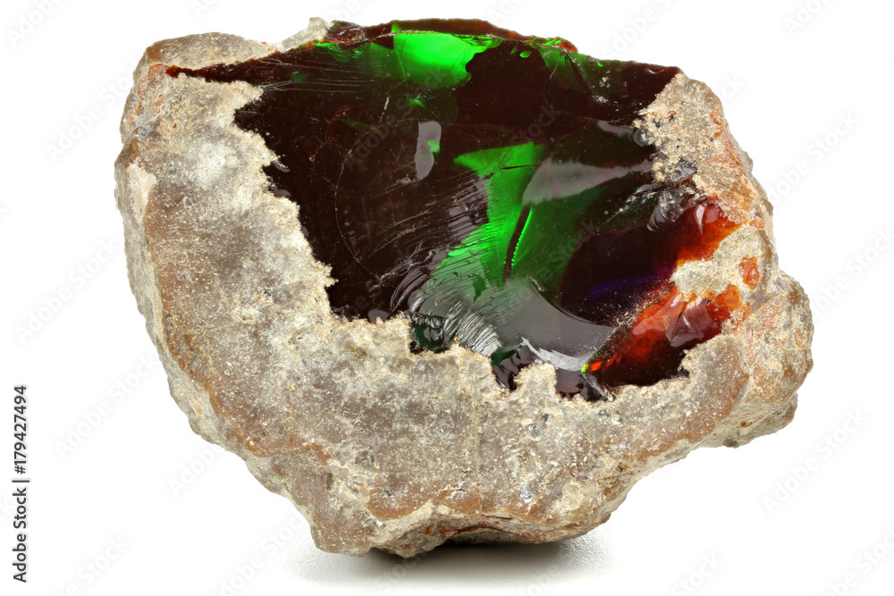 Fototapeta premium Ethiopian chocolate opal isolated on white background
