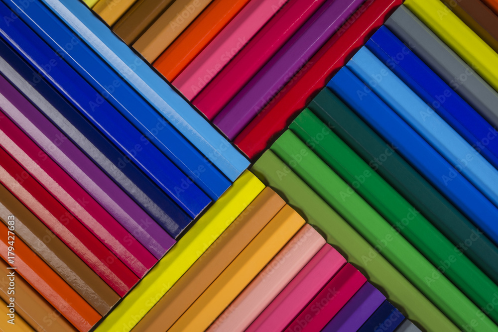Abstract pattern of wooden coloured pencils Abstract pattern of wooden coloured pencils