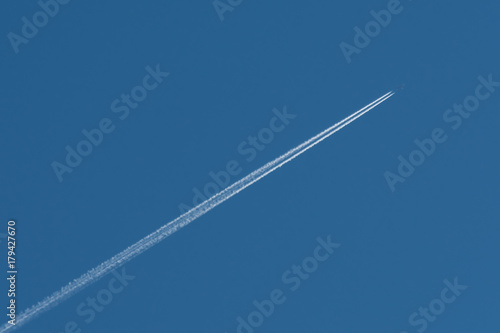vapor trail behind the plane