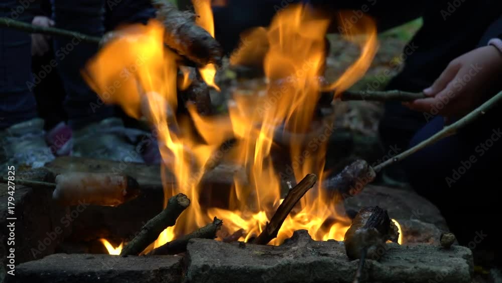 Sausages are burning on the fire Sausages are burning on the fire