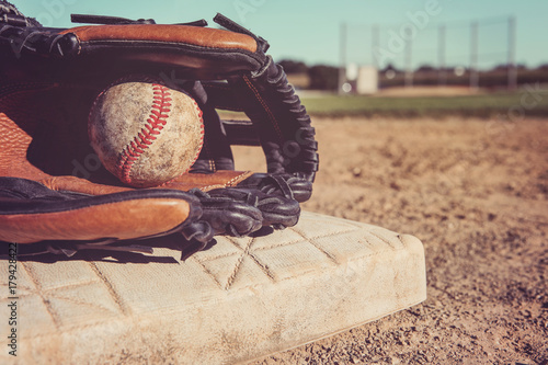 Photography Old Vintage Baseball and glove resting on a base