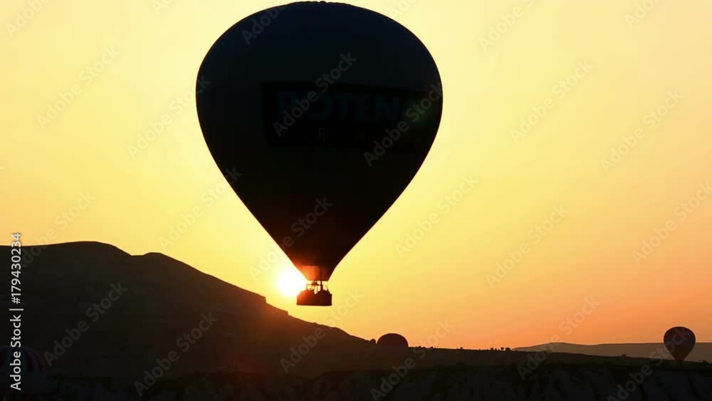Silhouette of hot air balloon in the sunset, Cappadocia, Turkey Silhouette of hot air balloon in the sunset, Cappadocia, Turkey