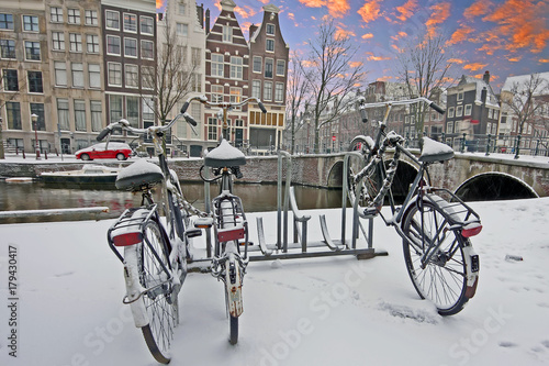 Photography Sunset in snowy Amsterdam Netherlands in winter