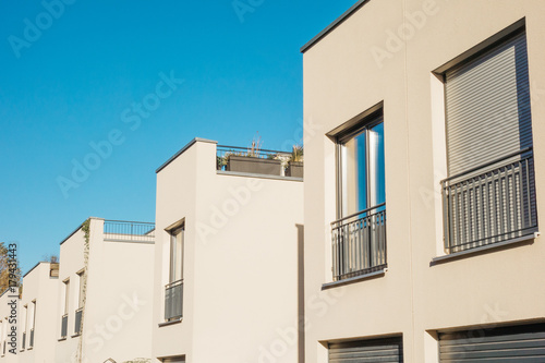 detailed view of modern white townhouses