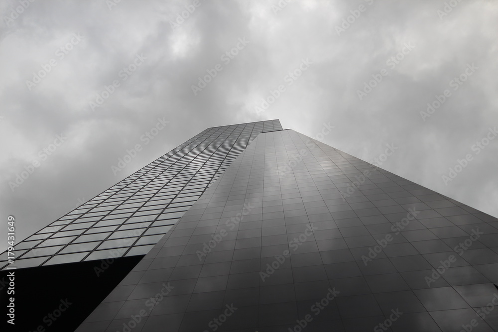 Skyscraper in Rotterdam with clouds reflection Skyscraper in Rotterdam with clouds reflection