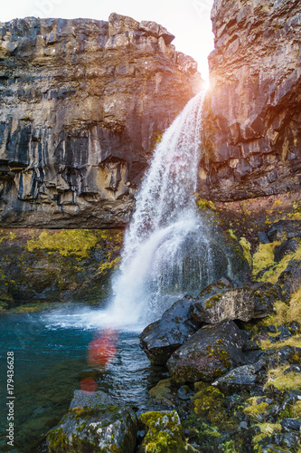 Small waterfall and a mountain stream