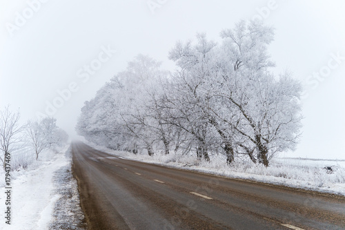 Winter asphalt road © Andrey