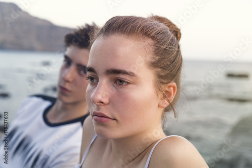 portrait of a young woman and man with the ocean in background © Armin Staudt