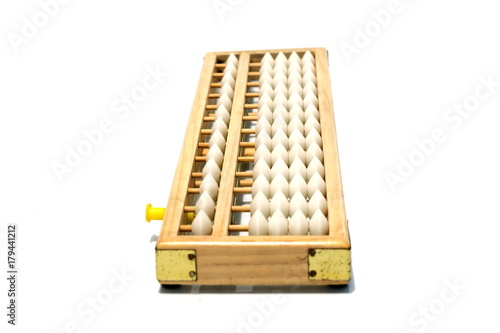 An abacus calculator for background and add text message.is a calculating tool that was in use in Europe, China and Russia, centuries. It are used to teach arithmetic. Education and Financial concept.