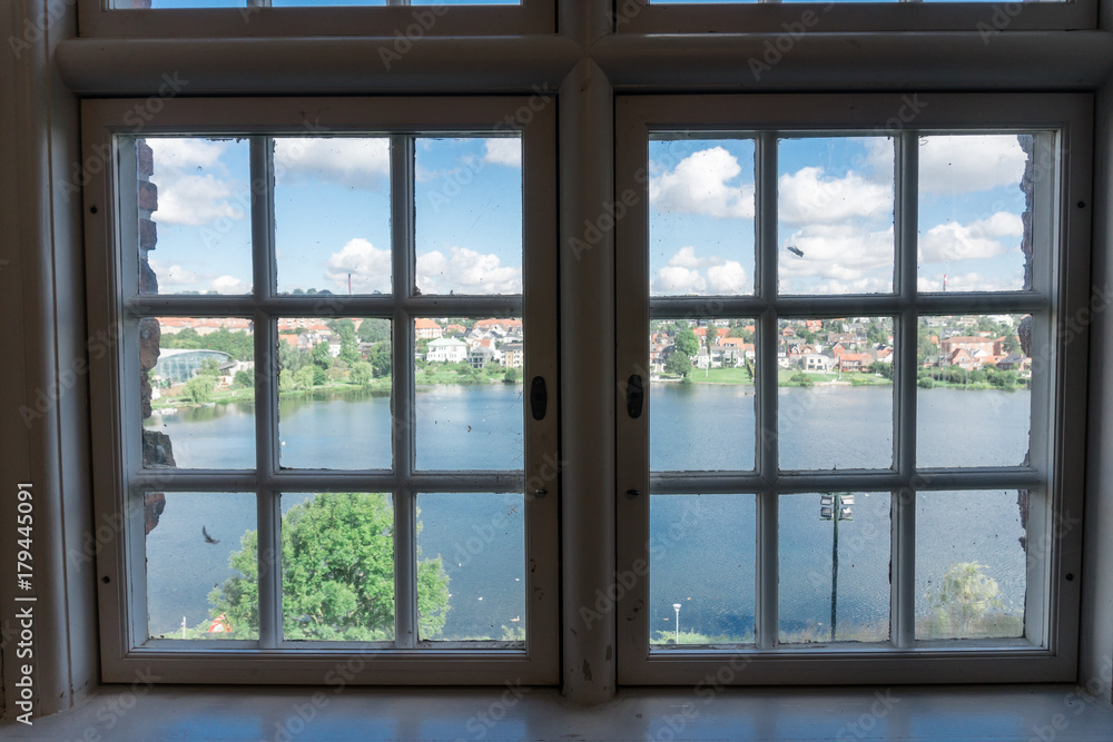 view of a lake from a window of koldinghus Castle in Kolding in Denmark view of a lake from a window of koldinghus Castle in Kolding in Denmark