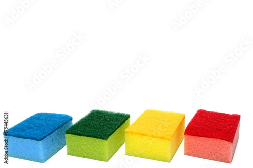 Various color of scouring pad and sponge isolated on white background with add text message. scouring pad and sponge is a cleaning tool used for scouring a surface and cleaning a dishes after cooking.