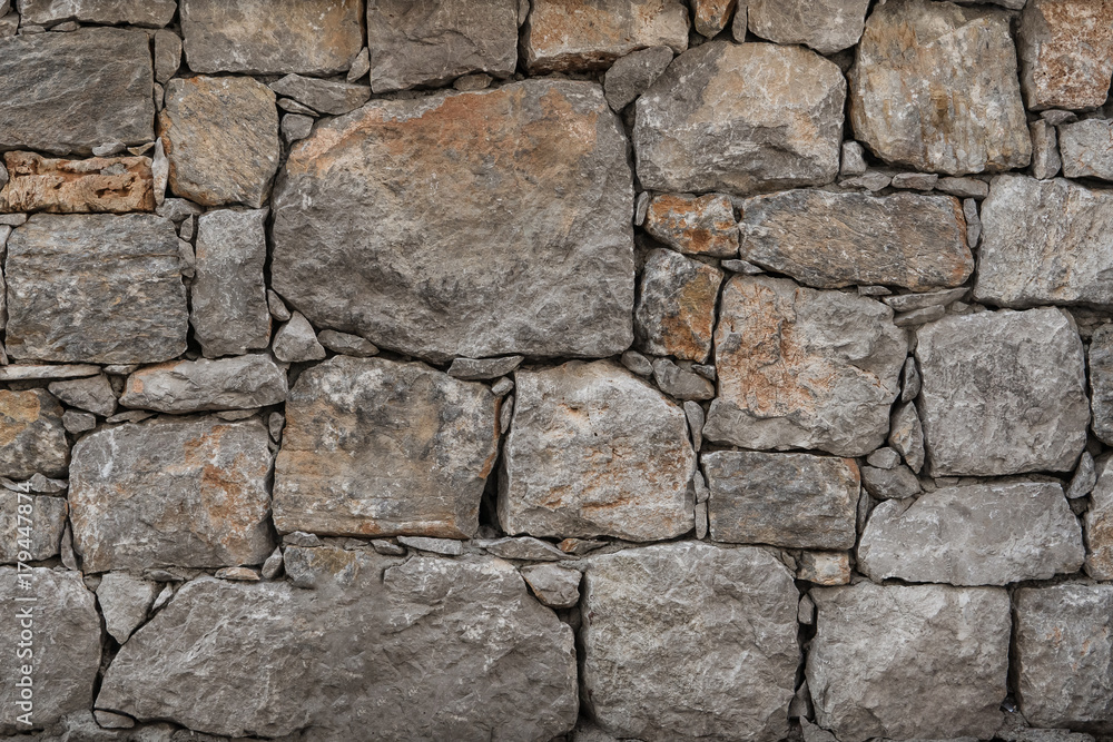 Granite texture, stone wall surface closeup Granite texture, stone wall surface closeup