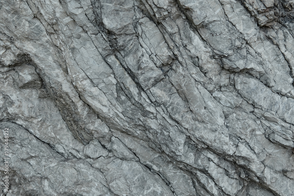 Aged gray stone macro, granite texture closeup Aged gray stone macro, granite texture closeup