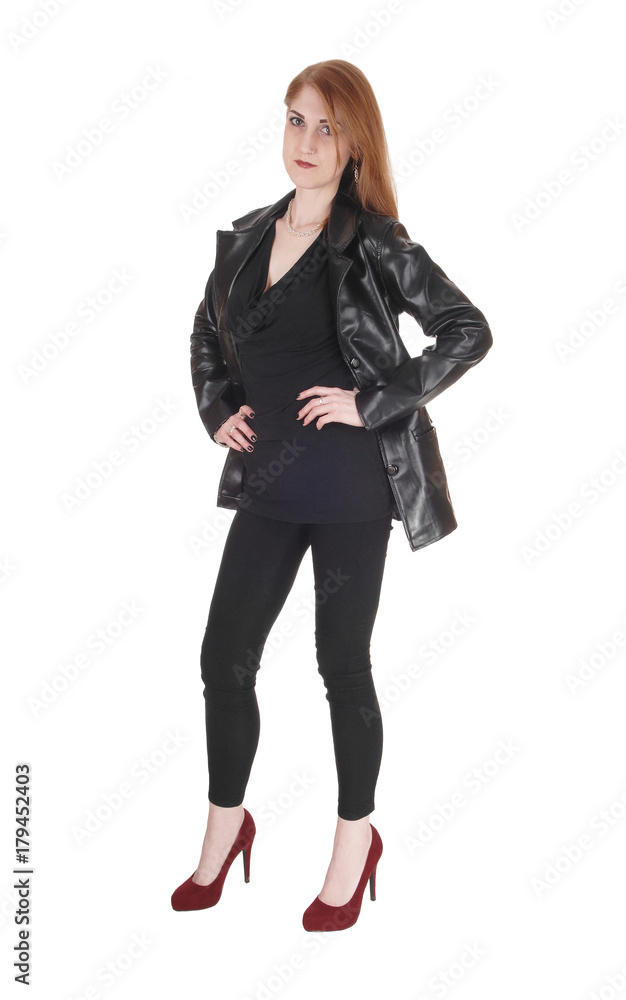 Woman standing in leather jacket Woman standing in leather jacket