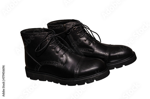 high black winter boots with lacing and lock on the thick sole, of leather and fur, comfortable and warm in the cold season