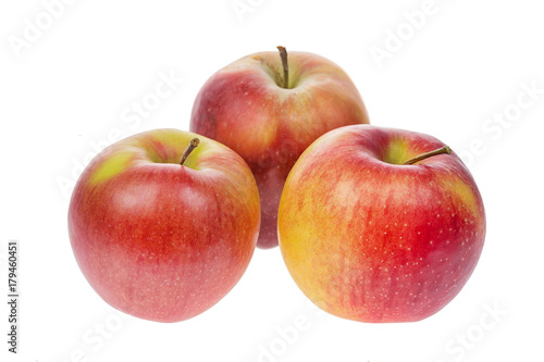 Fresh ripe red apples isolated on white background.