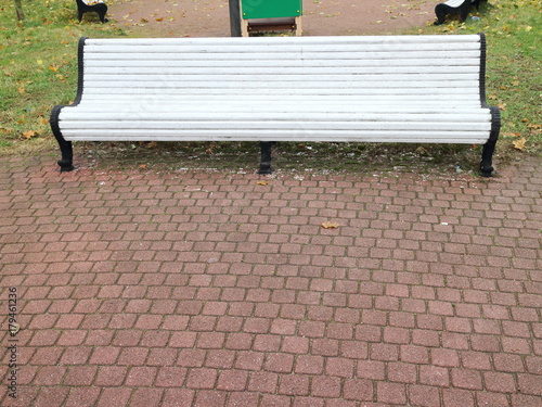 white bench in an autumn park