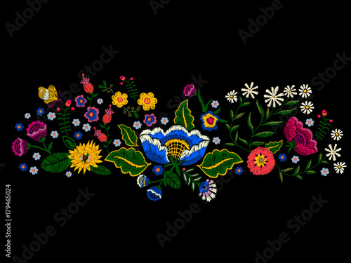 Embroidery landscape pattern with simplify flowers and butterfly. Vector embroidered native floral meadow. Tribal style design for fashion wearing.
