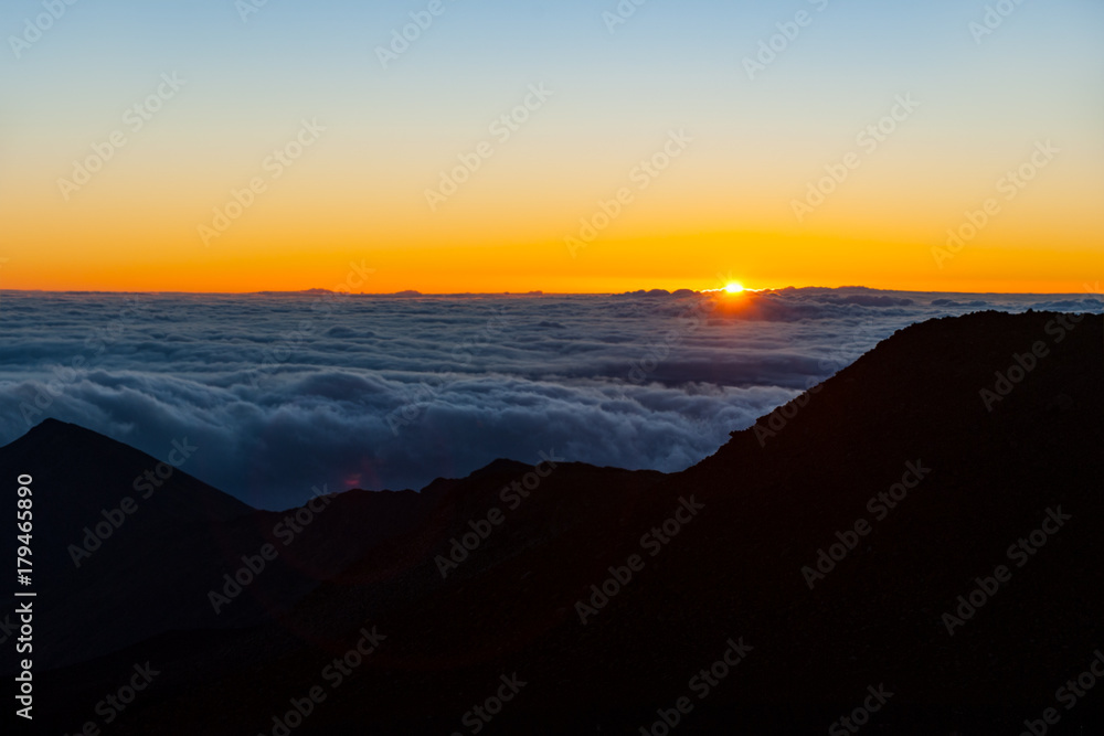 Sunrise at the  Haleakalā National Park 
summit, island of Maui, Hawaii 