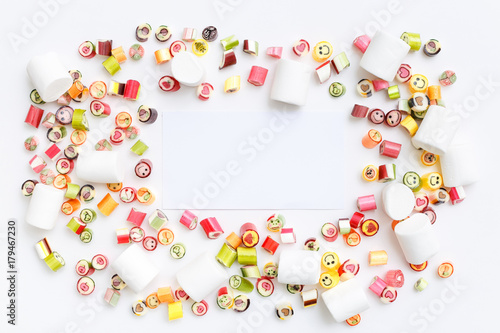 lollipops, candy, top view flat lay on colorful background
