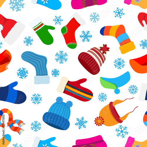 Seamless pattern of Christmas warm winter clothes in flat style on white background