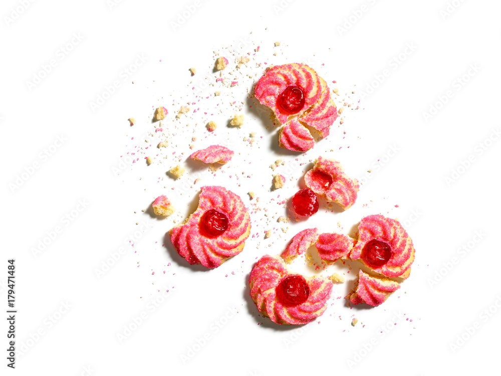 Broken cherry almond amaretti cookie crumbles isolated on white Broken cherry almond amaretti cookie crumbles isolated on white