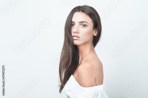 white Caucasian brunette girl female model attractive fit skinny sexy beautiful posing on studio white background portrait white shirt