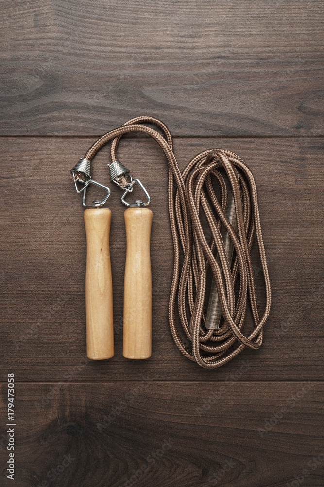 skipping rope for an exercise on the wooden table