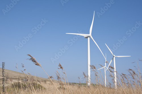 Wind turbines with blue sky background