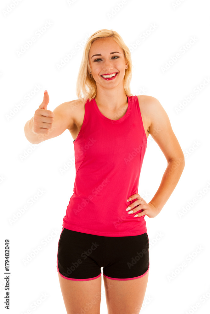Active blonde sporty woman shows thumb up as a gesture for success Active blonde sporty woman shows thumb up as a gesture for success