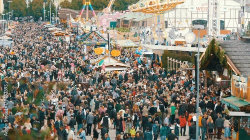 Wallpaper Mural September 17, 2017 - Oktoberfest, Munich, Germany:View of the huge crowd of people walking around the Oktoberfest in national bavarian suits, on Theresienwiese, top view Torontodigital.ca