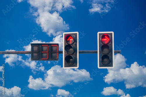 traffic light with on blue sky background photo