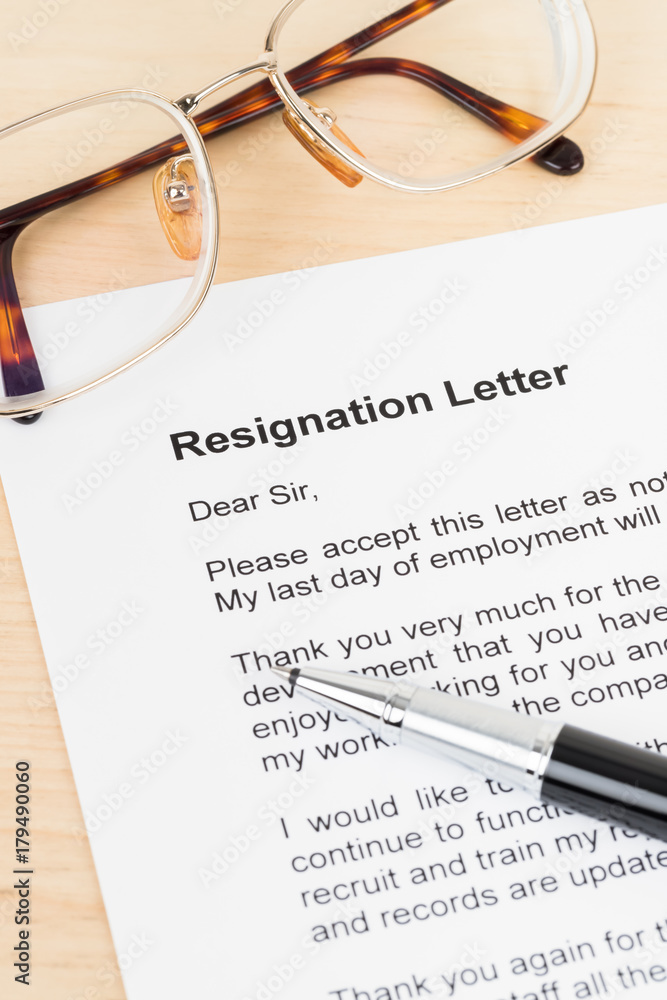 Resignation letter resign with pen and glasses