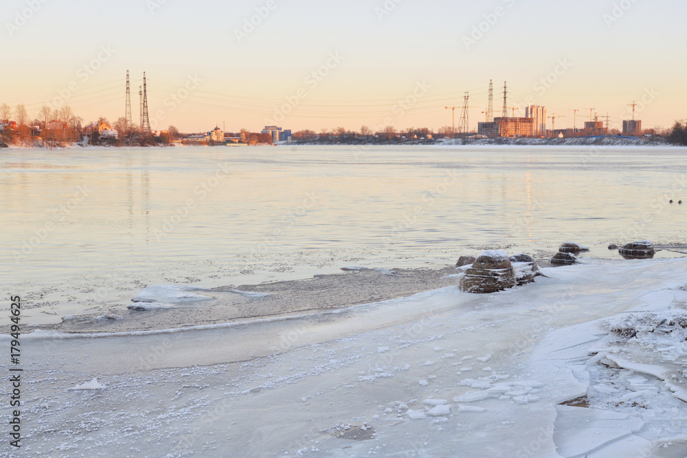 View of Neva River at winter sunset.