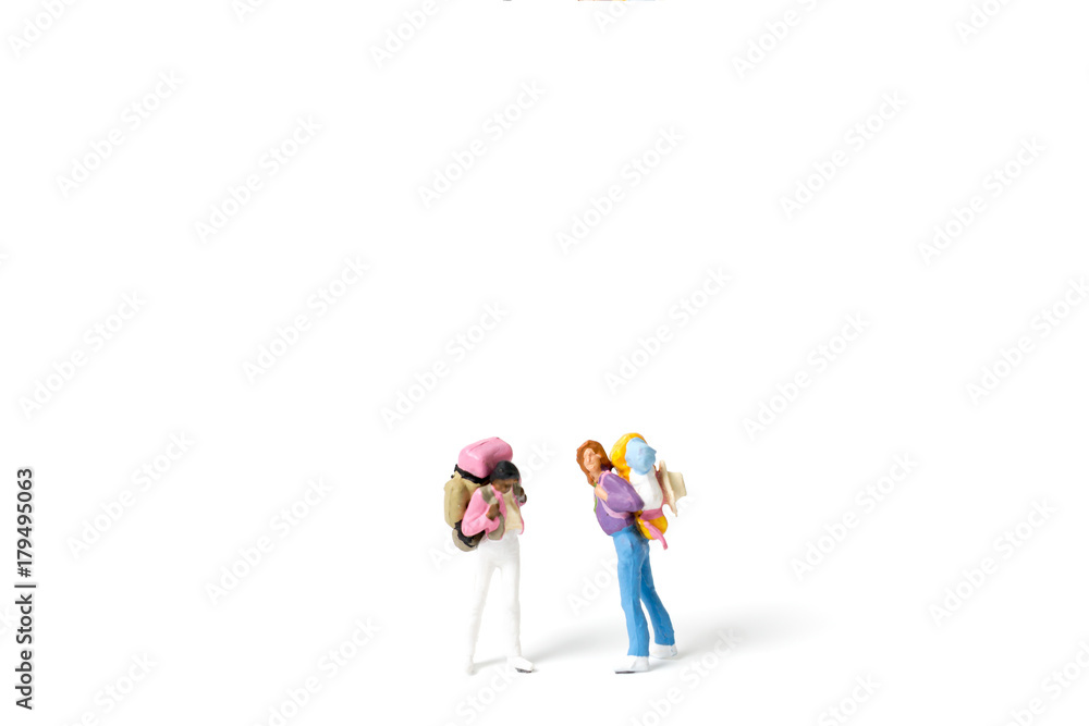 Fototapeta premium Miniature Backpacker isolated on white background