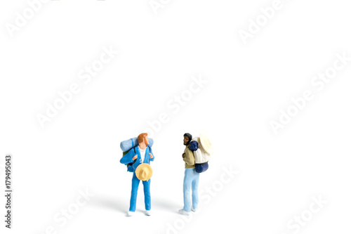 Miniature Backpacker isolated on white background