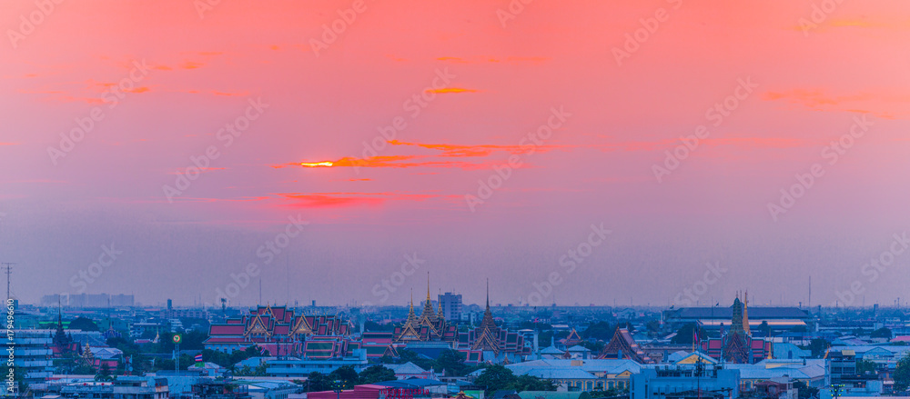  red sunset at Wat Pha Kaew temple of emerald Buddha and Grand Palace.